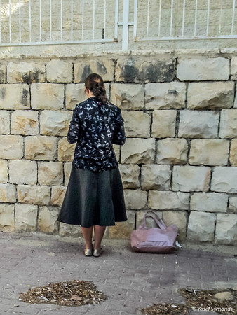 Woman Praying in Carpark 181015