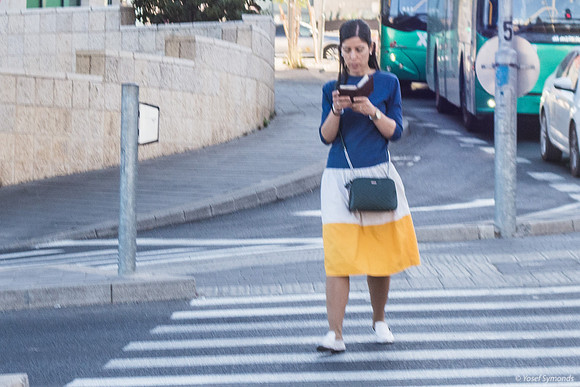 Woman Praying On the Move In the City 220615-2
