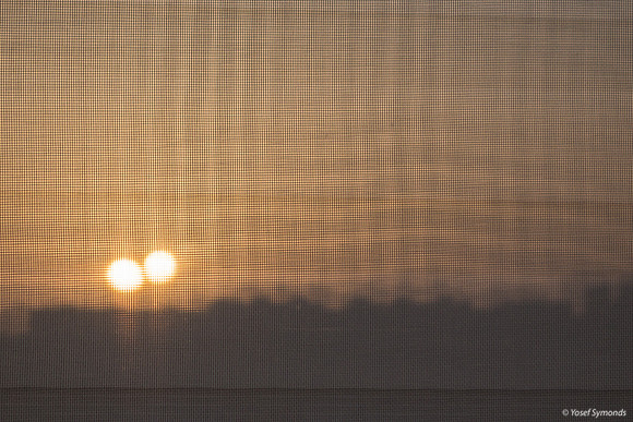 Double Sunset Reflected Through Screen 200329-1