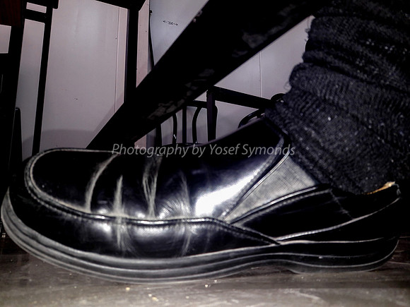 Man's Shoe Under Desk